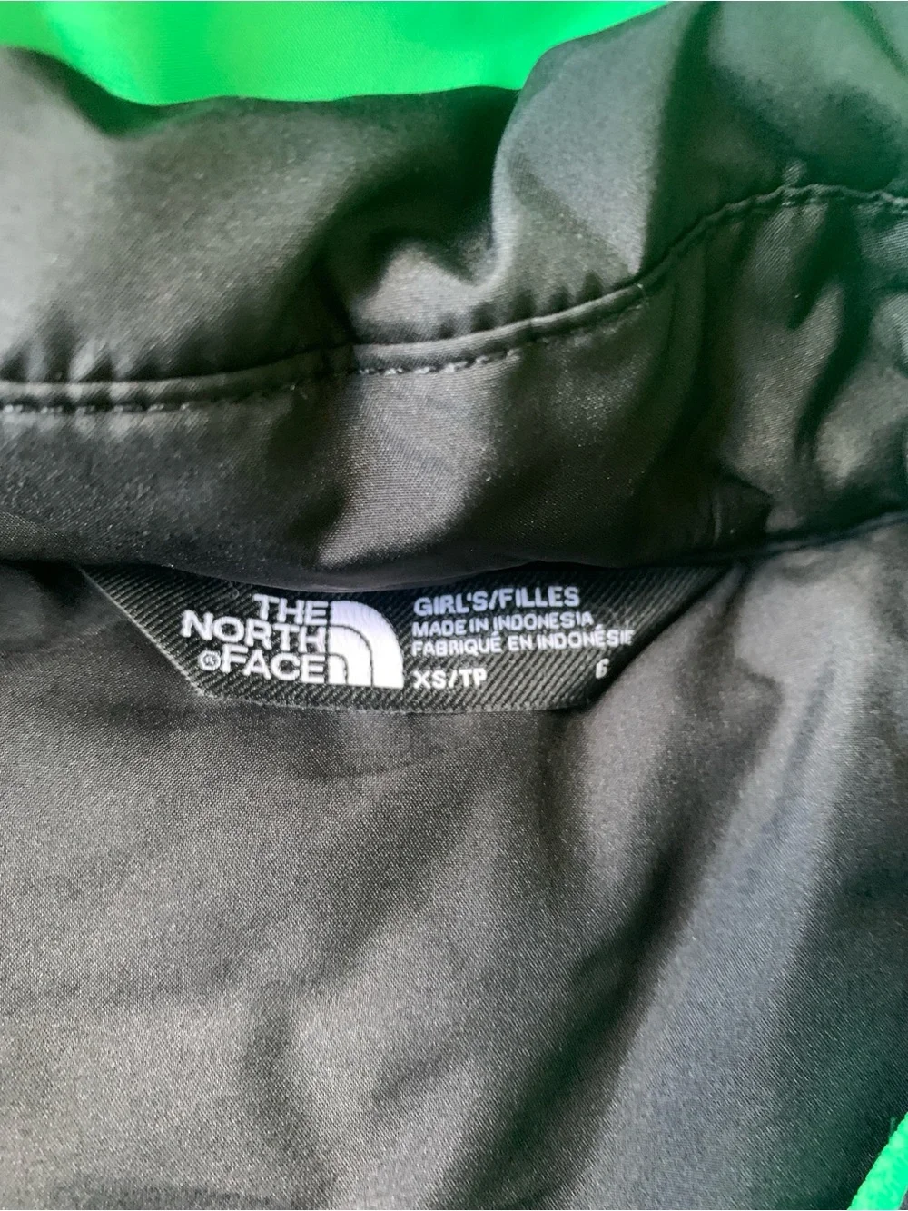 The North Face Black Hooded Jacket with Green Lining & Pink Zippers